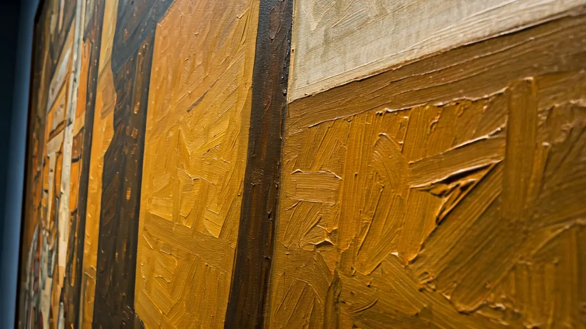 Imagen genérica de una sección de una pintura abstracta, con iluminación suave de museo.