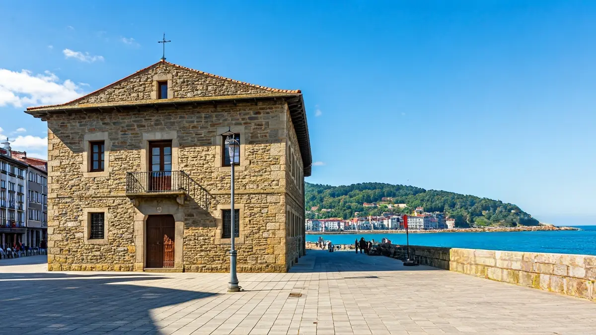 Historic building of the Plentzia Maritime Station, integrated into the coastal landscape.