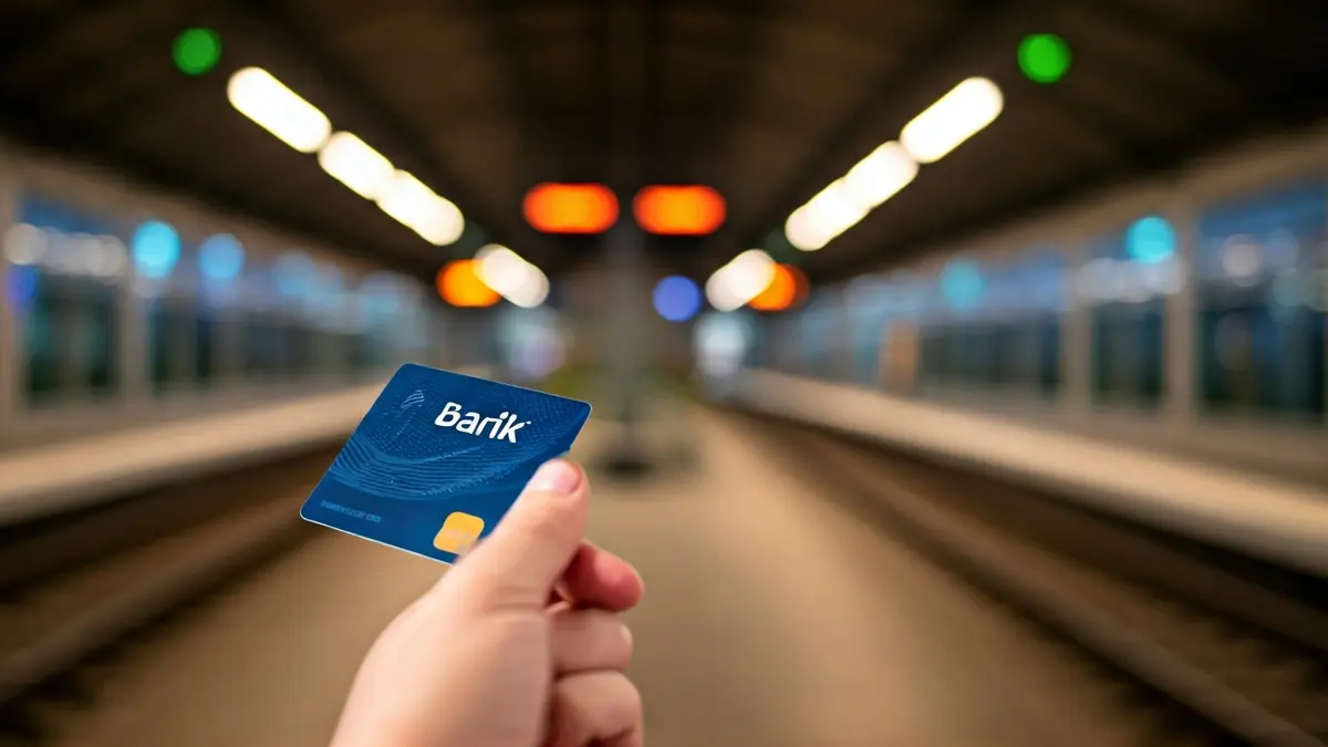 Barik card being tapped on a public transport validator, with a blurred modern train station in the background.