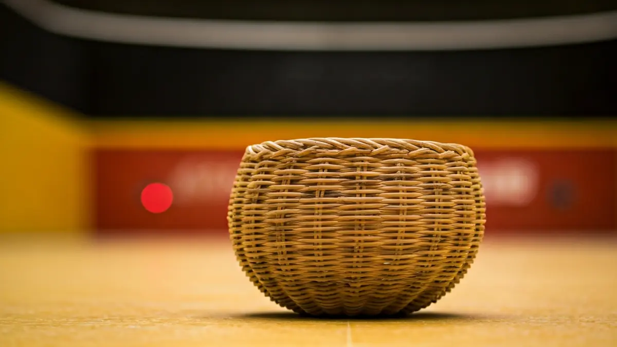 Generic image of a jai alai cesta punta basket and fronton details.