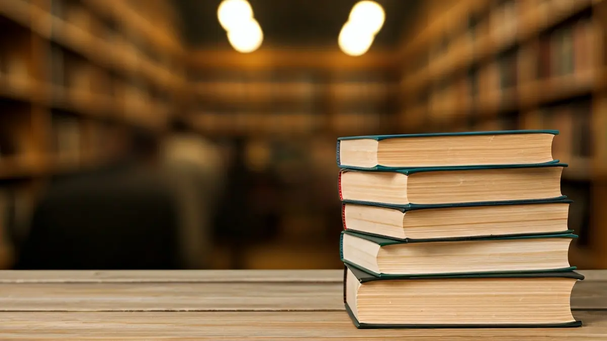 Generic image of a stack of old books, representing historical research and women's contributions.