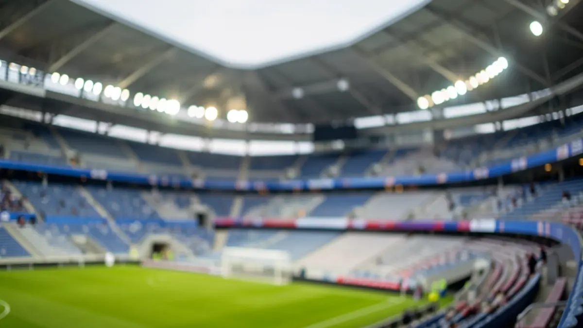Generic image of a sports arena with blurred lights and empty seating.