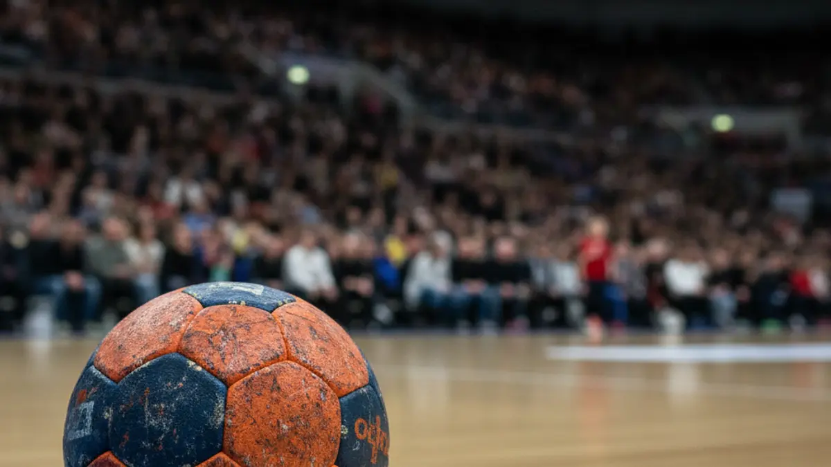 Generic image of a handball on a court.